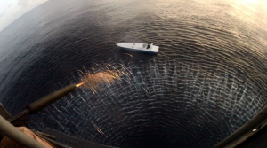 Royal Marine snipper takes out engine of speedboat being used for drug smuggling in the Caribbean