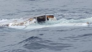 Remains of a ghost yacht floating in sea