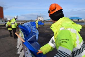 Workers from EA prepare for storm surge