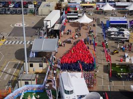 People form a human boat to beat the world record at the Southampton Boat Show