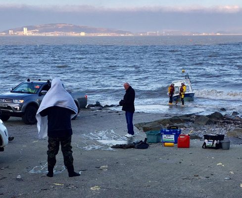 Fishing boat being towed at Mumbles