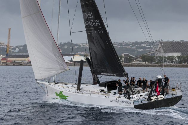 A VOR70 racing boat sails into Bridgetown, Barbados