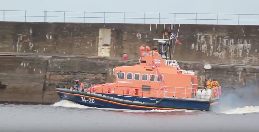 The RNLI lifeboat at Wick leaving the harbour