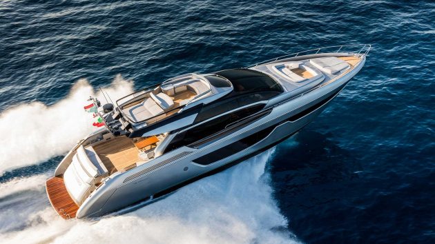 A motor yacht speeding along the water