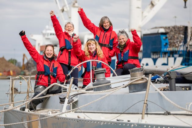 Crew of Maiden on board the yacht