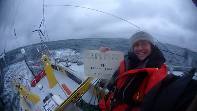 Woman on a yacht passing Cape Horn