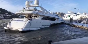 A superyacht sinking after a storm at Port d'Andratx, Mallorca