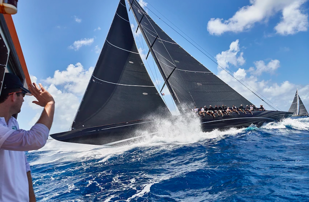 man greeting a yacht