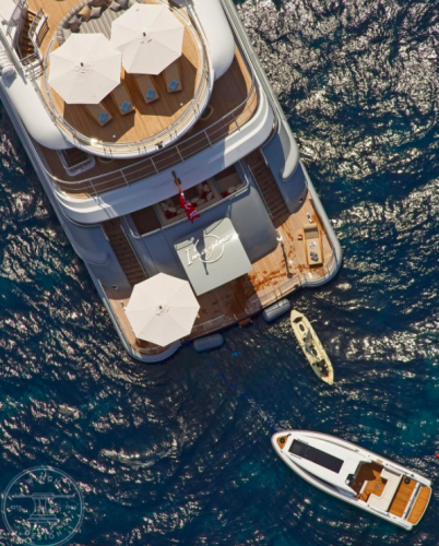 A motor yacht under a strong sun