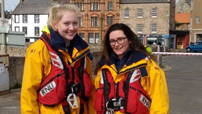 A schoolgirl and a mum of two, dressed in the RNLI yellow oilies and red lifejacket