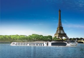 S.S. Joie de Vivre cruising past the Eiffel Tower on the river Seine