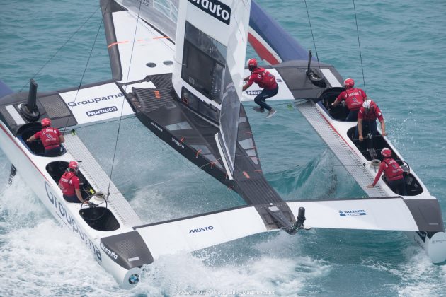 French sailors on a white America's Cup catamaran