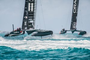 two catamaran competing on water