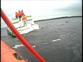 Passengers on a grounded boat in Lough Ree