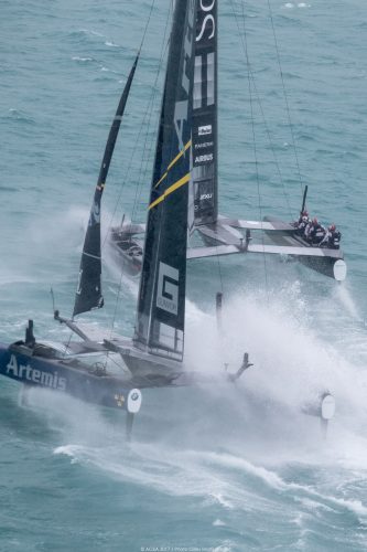Two America's Cup catamarans racing in windy conditions in Bermuda