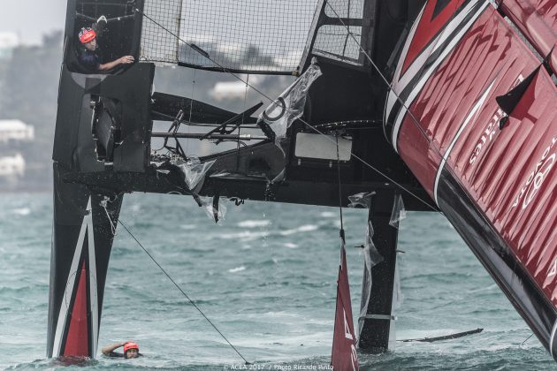 Damage to a black and red catamaran