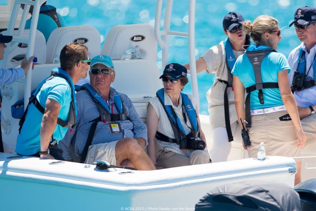 Princess Anne wearing sunglasses and a hat watching the America's Cup