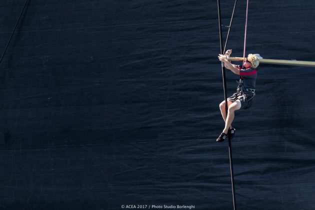 woman on yacht mast