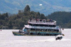 A tourist boat sinks in a reservoir in north west Colombia