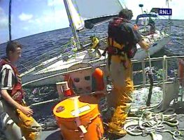 RNLI crew assist the skipper and crew of a sinking yacht off Ireland