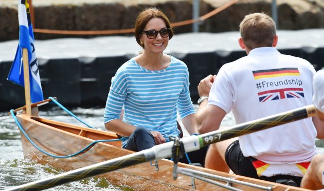 Duchess of Cambridge in a blue and white stripped top in a boat race
