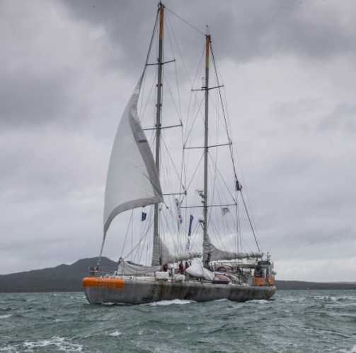 A yacht arriving in port
