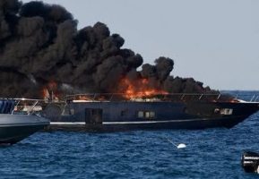 A motor yacht on fire off the coast of St Tropez