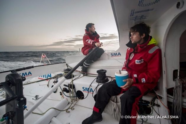 Two crew on an IMOCA 60