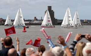 Crowds cheer at the start of the Clipper Round the World Yacht Race in Liverpool