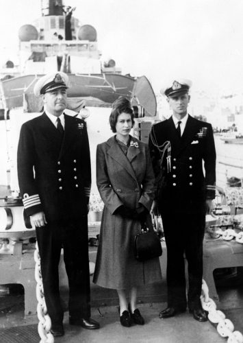 Queen and Prince Philip on board a naval ship