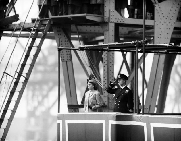 Prince Philip salutes at the launch of a ship