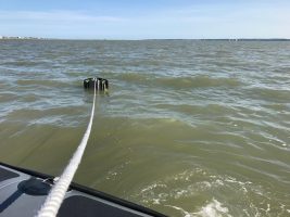 Jet ski towed by boat