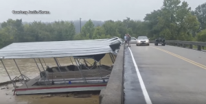 A boat ploughs into a bridge in Tennessee, USA after major flooding from Hurricane Harvey