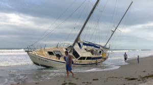 A yacht aground on a beach in Florida