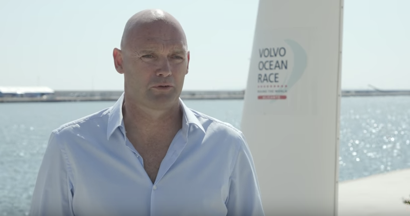 Mark Turner dressed in a white shirt talks about his decision to quit the Volvo Ocean Race