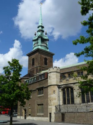 A church with a green spire in London where a memorial service is held each year to remember all those lost at sea