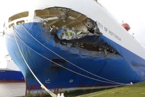 Damage caused to a blue and white car transporter after it hit a ferry on the River Humber