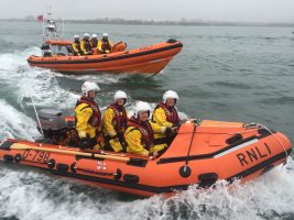 rnli lifeboats at sea