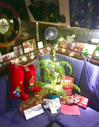 interior of a boat decorated for Christmas