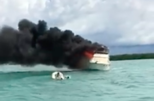 kurt williamson rescues men on boat on fire australia