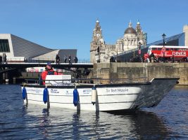 Wheelyboat with liverpool in the background