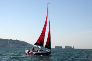 Natasha Lambert BEM sailing on her Miss Isle Too boat