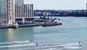 jet skis being chased down River Thames by police