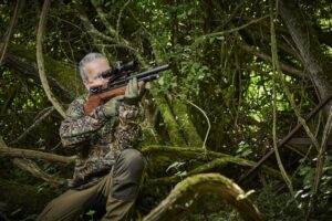 man shooting air rifle