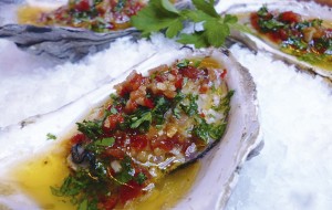 Grilled oysters with parsley, lemon and bacon