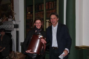 Winner Kate Hayward is rpesented with the Growler hip flask by Richard Wright, Chairman of the Northamptonshire GWCT