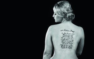 Hotties naked charity calendar. Emma Bond with A Soldier's Prayer inscribed on her back was one of the 2014 Hotties. Look out for this year's calendar