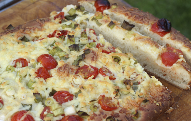 Wensleydale focaccia with tomato and spring onions