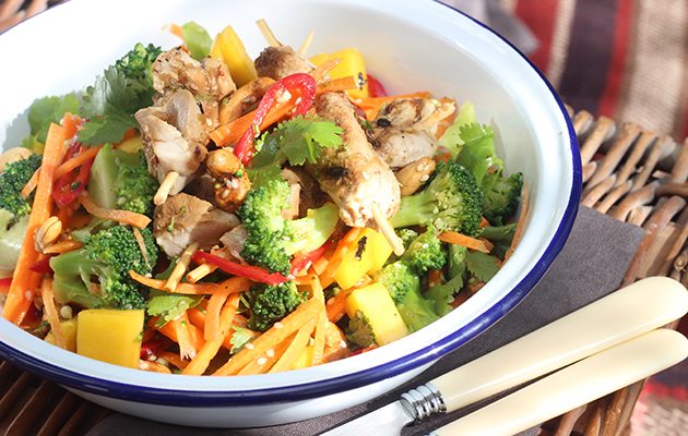 Wild rabbit skewers with a toasted cashew, mango and carrot salad