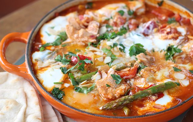 Shakshuka with trout and asparagus